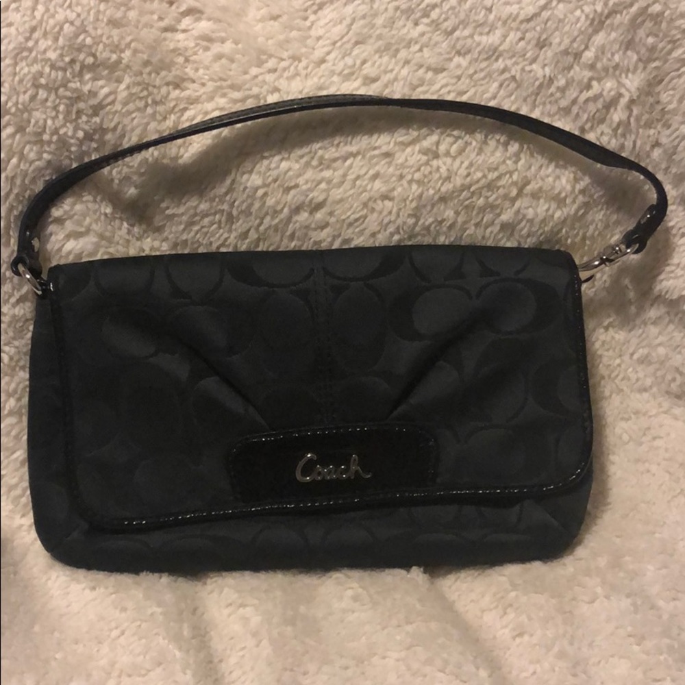 Coach wristlet with adjustable strap